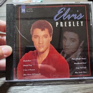 Elvis Presley 14 Classic Hits CDTested and works.Light surface scratches on t